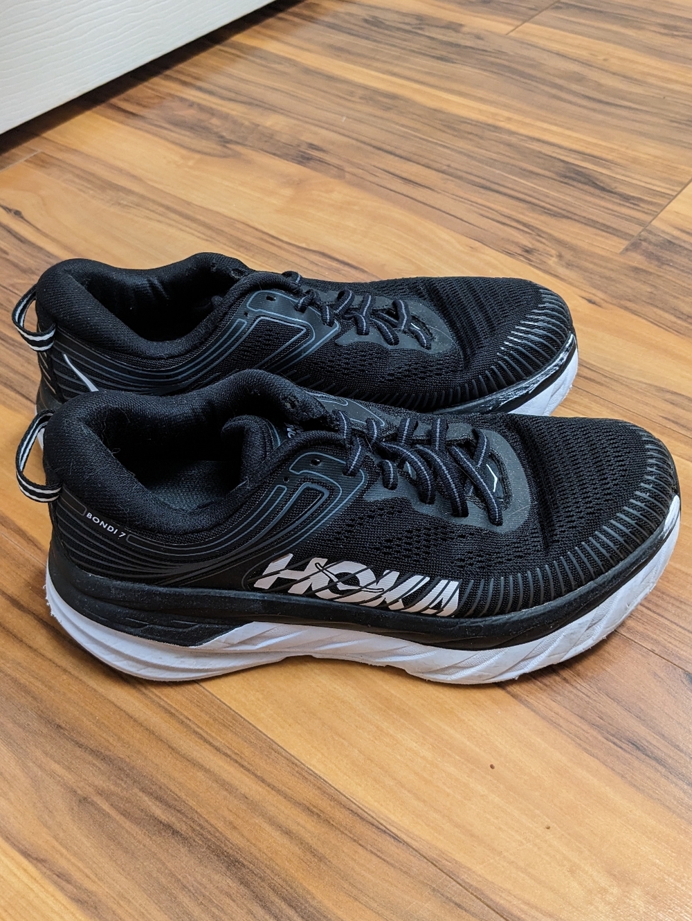 Hoka Bondi 7 Black and White Running Shoes - W 9